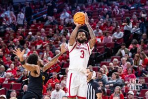 Nebraska Cornhusker guard Brice Williams (3) makes a three point shot against Bethune-Cookman Wildcat guard Brayon Freeman (2)in the second half during a college baskteball game Saturday, November 9, 2024, in Lincoln, Nebraska. Photo by John S. Peterson.