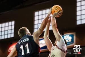 Nebraska Cornhusker forward Berke Buyuktuncel (9) up against St. Mary's Gaels center Mitchell Saxen (11) during a college basketball game Sunday, November 17, 2024 in Sioux Falls, South Dakota.