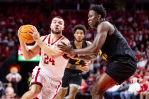 Nebraska Cornhusker guard Rollie Worster (24) drives to the basket against Bethune-Cookman Wildcat center David Onanina (33)in the second half during a college baskteball game Saturday, November 9, 2024, in Lincoln, Nebraska. Photo by John S. Peterson.