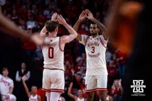 Nebraska Cornhuskers guard Brice Williams (3) gets a high five from guard Connor Essegian (0) after making a three-point basket against the South Dakota Coyotes in the first half during a college basketball game Wednesday, November 27, 2024, in Lincoln, Nebraska. Photo by John S. Peterson.