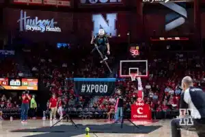 XPOGO Stunt Team entertains the fans at halftime during a college baskteball game between the Nebraska Cornhuskers and the UT Rio Grande Valley Vaqueros Monday, November 4, 2024, in Lincoln, Nebraska. Photo by John S. Peterson.