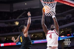 Nebraska Cornhusker forward Juwan Gary (4) makes a lay up against Bethune-Cookman Wildcat guard Gianni Hunt (5) in the second half during a college baskteball game Saturday, November 9, 2024, in Lincoln, Nebraska. Photo by John S. Peterson.