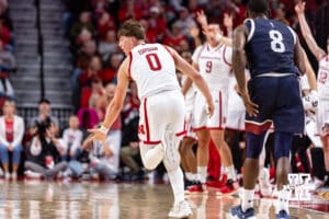 Nebraska Cornhusker guard Connor Essegian (0) celebrates his three-point shot in the first half against the Fairleigh Dickinson Knights during a college basketball game Wednesday, November 13, 2024, in Lincoln, Nebraska. Photo by John S. Peterson.