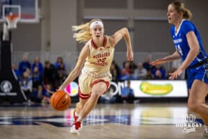 Nebraska Cornhusker guard Britt Prince (23) dribbles the ball against Creighton Bluejay forward Mallory Brake (14) in the second half during a women’s college basketball game Friday, November 22, 2024 in Omaha, Nebraska. Photo by John S. Peterson.