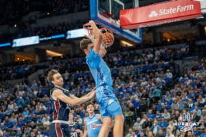 Ryan Kalkbrenner dunks the ball in transition during a college basketball game November 10th, 2024 in Omaha Nebraska. Photo by Brandon Tiedemann.