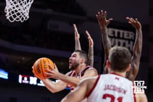 Nebraska Cornhusker guard Rollie Worster (24) drives to the basket for a layup against the Fairleigh Dickinson Knights in the first half during a college basketball game Wednesday, November 13, 2024, in Lincoln, Nebraska. Photo by John S. Peterson.