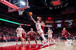 Nebraska Cornhuskers guard Connor Essegian (0) makes a layup against the South Dakota Coyotes in the first half during a college basketball game Wednesday, November 27, 2024, in Lincoln, Nebraska. Photo by John S. Peterson.