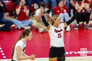 Nebraska Cornhusker middle blocker Andi Jackson (15) celebrates a point scored against the Wisconsin Badgers in the third set during a college volleyball match Saturday, November 23, 2024 in Lincoln, Nebraska. Photo by John S. Peterson.