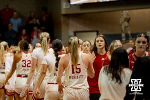 Nebraska Cornhuskers and South Dakota Coyotes give each other high fives after a college women's basketball game Saturday, November 16, 2024 in Sioux Falls, South Dakota. Photo by Collin Stilen.