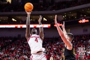 Nebraska Cornhusker forward Juwan Gary (4) makes a lay up against Bethune-Cookman Wildcat forward Jesus Carralero Martin (12) in the second half during a college baskteball game Saturday, November 9, 2024, in Lincoln, Nebraska. Photo by John S. Peterson.