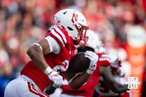 Nebraska Cornhusker running back Dante Dowdell (23) runs with the ball against the Wisconsin Badgers during a college football game Saturday, November 23, 2024 in Lincoln, Nebraska. Photo by John S. Peterson.