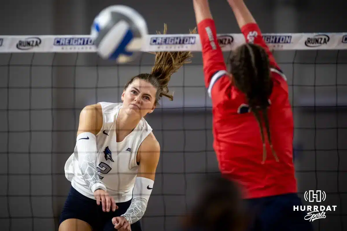 Creighton Bluejay outside hitter Norah Sis (2) spikes the ball against the St. John's Red Storm in the third set during a college volleyball match Friday, November 1, 2024, in Omaha, Nebraska. Photo by John S. Peterson.