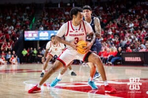 Nebraska Cornhusker guard Brice Williams (3) drives to the basket against Fairleigh Dickinson Knight guard Terrence Brown (2) in the second half during a college basketball game Wednesday, November 13, 2024, in Lincoln, Nebraska. Photo by John S. Peterson.