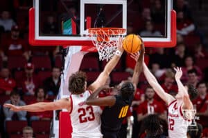 Nebraska Cornhusker forward Andrew Morgan (23) and guard Gavin Griffiths (12) block a shot from Bethune-Cookman Wildcat forward Kalil Camara (10) in the second half during a college baskteball game Saturday, November 9, 2024, in Lincoln, Nebraska. Photo by John S. Peterson.