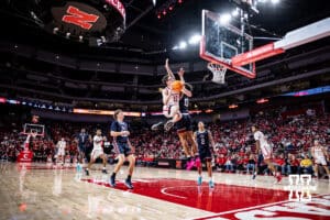 Nebraska Cornhusker guard Gavin Griffiths (12) makes a layup against the Fairleigh Dickinson Knights in the second half during a college basketball game Wednesday, November 13, 2024, in Lincoln, Nebraska. Photo by John S. Peterson.