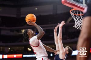 Nebraska Cornhusker guard Ahron Ulis (2) makes a layup against the Fairleigh Dickinson Knights in the second half during a college basketball game Wednesday, November 13, 2024, in Lincoln, Nebraska. Photo by John S. Peterson.