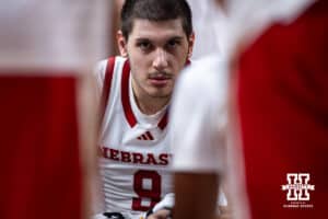 Nebraska Cornhusker forward Berke Buyuktuncel (9) sitting the huddle at a time out during a college basketball game against the Fairleigh Dickinson Knights Wednesday, November 13, 2024, in Lincoln, Nebraska. Photo by John S. Peterson.