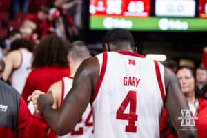 Nebraska Cornhusker forward Juwan Gary (4) fist bumps a fan on the way to the locker room after the win over the Bethune-Cookman Wildcats during a college baskteball game Saturday, November 9, 2024, in Lincoln, Nebraska. Photo by John S. Peterson.