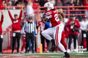 Nebraska Cornhusker running back Dante Dowdell (23) scores a touchdown against the Wisconsin Badgers in the second quarter during a college football game Saturday, November 23, 2024 in Lincoln, Nebraska. Photo by John S. Peterson.