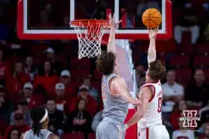 Nebraska Cornhusker guard Connor Essegian (0) makes a lay up against UT Rio Grande Valley Vaqueros forward Marshal Destremau (21) in the second half during a college baskteball game Monday, November 4, 2024, in Lincoln, Nebraska. Photo by John S. Peterson.