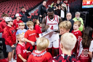 Nebraska Cornhusker forward Juwan Gary (4) and other players made their way back out of the locker room to sign autographs after the win over the Bethune-Cookman Wildcats during a college baskteball game Saturday, November 9, 2024, in Lincoln, Nebraska. Photo by John S. Peterson.