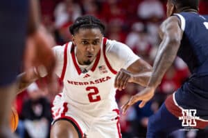 Nebraska Cornhusker guard Ahron Ulis (2) drives to the basket against the Fairleigh Dickinson Knights in the second half during a college basketball game Wednesday, November 13, 2024, in Lincoln, Nebraska. Photo by John S. Peterson.