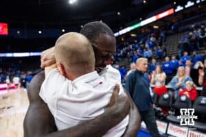 Nebraska Cornhusker forward Juwan Gary (4) gets a hug from assistant coach Nate Loenser after the win over the Creighton Bluejays during a college basketball game Friday, November 22, 2024 in Omaha, Nebraska. Photo by John S. Peterson.