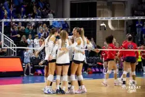 Creighton Bluejays celebrate sweeping the St. John's Red Storm during a college volleyball match Friday, November 1, 2024, in Omaha, Nebraska. Photo by John S. Peterson.