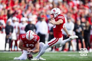 Nebraska Cornhusker place kicker John Hohl (90) kicks an extra point against the Wisconsin Badgers during a college football game Saturday, November 23, 2024 in Lincoln, Nebraska. Photo by John S. Peterson.