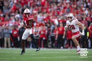 Nebraska Cornhusker wide receiver Jahmal Banks (4) makes a catch against Wisconsin Badger linebacker Christian Alliegro (28) in the second quarter during a college football game Saturday, November 23, 2024 in Lincoln, Nebraska. Photo by John S. Peterson.