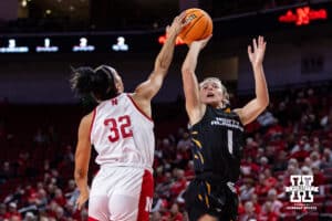 Nebraska Cornhusker forward Kendall Coley (32) blocks a shot from North Alabama Lion guard Emma Kate Tittle (1) in the first quarter during a college women’s basektball game Tuesday, November 19, 2024 in Lincoln, Nebraska. Photo by John S. Peterson.