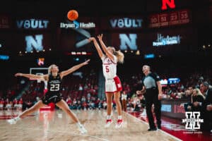 Alberte Rimdal (5) shoots the ball while Alyssa Clutter (23) plays defense during a college basketball game Tuesday, November 19, 2024, in Lincoln, Nebraska. Photo by Charlotte A. Gottfried.