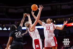 Nebraska Cornhusker guard Amiah Hargrove (33) reaches for the rebound with forward Jessica Petrie (12) against North Alabama Lion forward India Howard (22) in the second quarter during a college women’s basektball game Tuesday, November 19, 2024 in Lincoln, Nebraska. Photo by John S. Peterson.