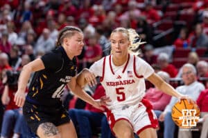 Nebraska Cornhusker guard Alberte Rimdal (5) dribbles the ball against North Alabama Lion guard Charity Gallegos (10) in the third quarter during a college women’s basektball game Tuesday, November 19, 2024 in Lincoln, Nebraska. Photo by John S. Peterson.