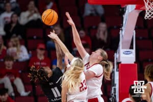 Nebraska Cornhusker guard Britt Prince (23) and forward Petra Bozan (44) block North Alabama Lion guard Veronaye Charlton (11) during a college women’s basektball game Tuesday, November 19, 2024 in Lincoln, Nebraska. Photo by John S. Peterson.