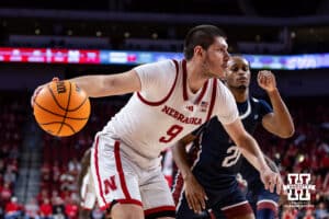 Nebraska Cornhusker forward Berke Buyuktuncel (9) drives to the basket against Fairleigh Dickinson Knight forward Cameron Tweedy (21) in the second half during a college basketball game Wednesday, November 13, 2024, in Lincoln, Nebraska. Photo by John S. Peterson.