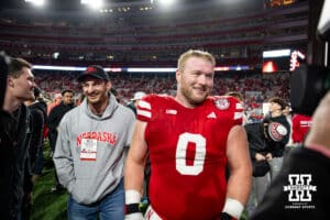 Nebraska Cornhusker defensive lineman Nash Hutmacher (0) celebrates with Luke Reimer the win over the Wisconsin Badgers during a college football game Saturday, November 23, 2024 in Lincoln, Nebraska. Photo by John S. Peterson.