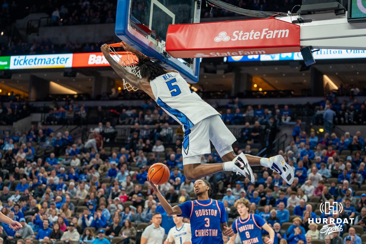 Jamiya Neal dunks during a college basketball game November 13th, 2024 in Omaha Nebraska Photo by Brandon Tiedemann