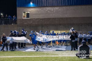 Bennington runs onto the filed before a high school football game November 15th, 2024 in Bennington Nebraska Photo by Brandon Tiedemann