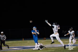 Houston Hill looks to complete a pass during a high school football game November 15th, 2024 in Bennington Nebraska Photo by Brandon Tiedemann