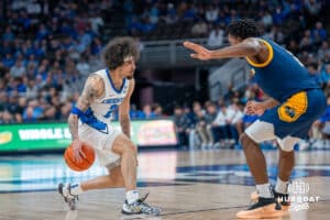 Creighton Bluejay Pop Isaac dribbles the basketball against UMKC during a college basketball game Saturday, November 16th, 2024 in Omaha Nebraska. Photo by Brandon Tiedemann.