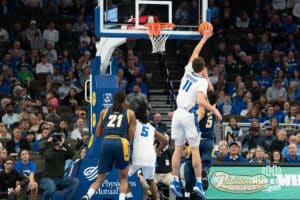 Creighton Bluejay Ryan Kalkbrenner blocks a shot against UMKC during a college basketball game Saturday, November 16th, 2024 in Omaha Nebraska. Photo by Brandon Tiedemann.