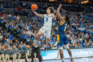 Creighton Bluejay Pop Isaac drives to the hoop against UMKC during a college basketball game Saturday, November 16th, 2024 in Omaha Nebraska. Photo by Brandon Tiedemann.