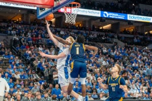 Creighton Bluejay Jackson McAndrew gets fouled attempting a layup against UMKC during a college basketball game Saturday, November 16th, 2024 in Omaha Nebraska. Photo by Brandon Tiedemann.