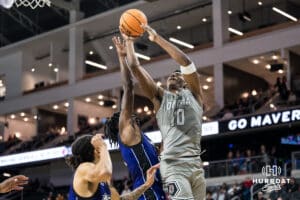 Omaha Mavericks Marquel Sutton attempts a shot during a college basketball game on November 30th, 2024 in Omaha Nebraska. Photo by Brandon Tiedemann.