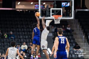 Omaha Mavericks Valentino Simon contests a dunk during a college basketball game on November 30th, 2024 in Omaha Nebraska. Photo by Brandon Tiedemann.