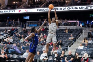 Omaha Mavericks Marquel Sutton shoots a three pointer during a college basketball game on November 30th, 2024 in Omaha Nebraska. Photo by Brandon Tiedemann.