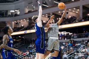 Omaha Mavericks Lance Waddles attempts a layup during a college basketball game on November 30th, 2024 in Omaha Nebraska. Photo by Brandon Tiedemann.