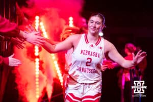 Nebraska Cornhuskers guard Logan Nissley (2) leads the Husker out to the court against the Minnesota Golden Gophers during a college basketball game Sunday, December 8, 2024, in Lincoln, Nebraska. Photo by John S. Peterson.