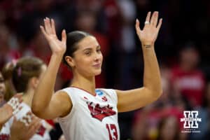 Nebraska Cornhuskers outside hitter Merritt Beason (13) is introduced to the fans before taking on the Wisconsin Badgers during the final regional match in the NCAA championship Sunday, December 15, 2024, in Lincoln, Nebraska. Photo by John S. Peterson.